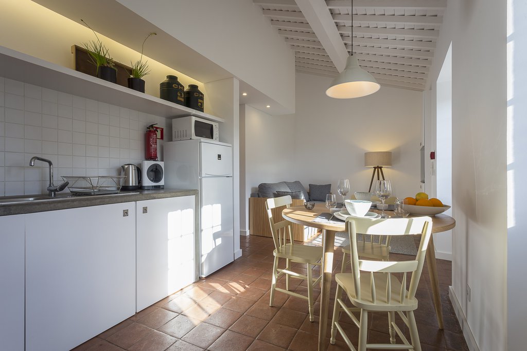 House accommodations/lodging at Quinta dos Peixes Falantes: bright, spacious kitchenette and dining area